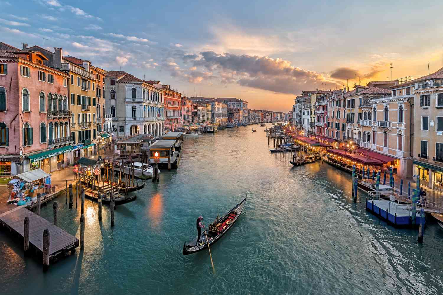 Venice's Grand Canal and a gondola at sunset